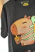 Remerón Oversize Capybara Mochila
