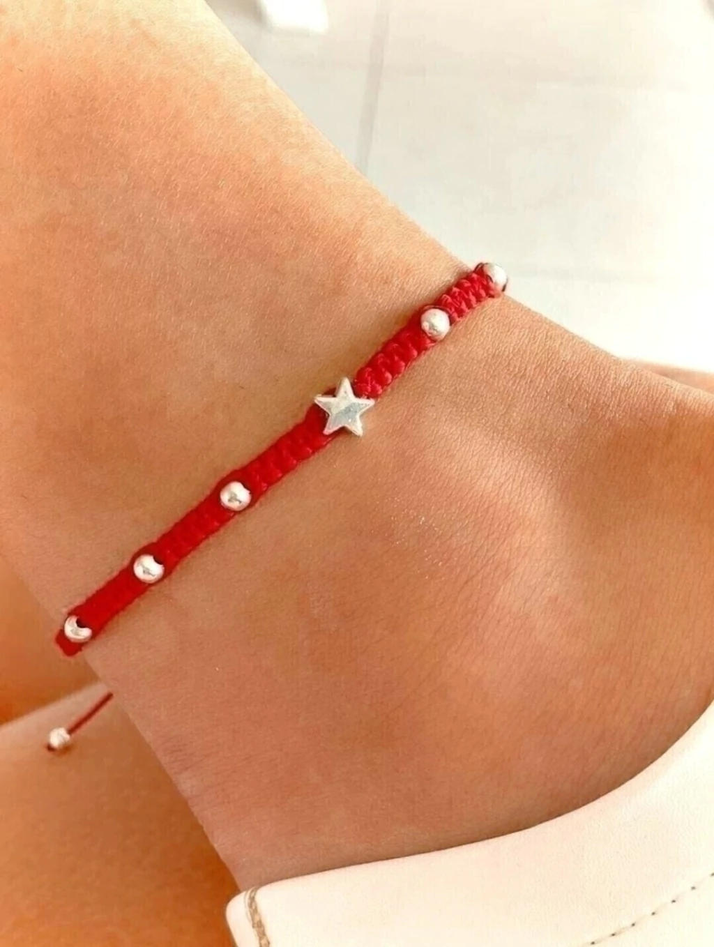 Tobillera hilo ajustable estrella y bolitas plateadas/Acero blanco