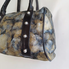 BOLSO DE MANO TACHAS DANIEL VALDEZ en internet