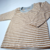 Camiseta bebé rayada tierra y blanco