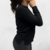 Sweater de bremer color negro con trenzado al medio en internet