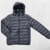 Campera inflable de mujer con capucha color negro en internet
