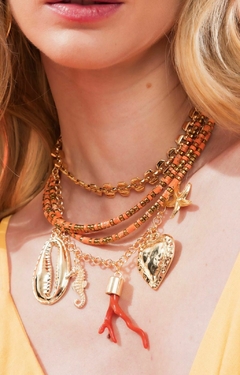 COLAR CHOKER DISCOS DE HOWLITA LARANJA COM HEMATITA na internet