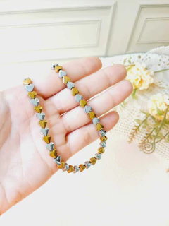 COLAR CHOKER CORAÇÃO DE HEMATITA METALIZADA na internet