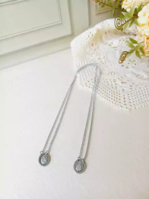 ESCAPULÁRIO OVAL EM AÇO INOXIDÁVEL NOSSA SENHORA APARECIDA