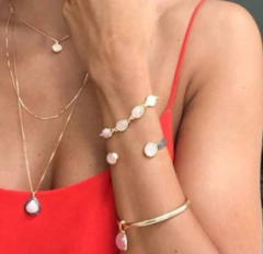 BRACELETE PULSEIRA BANHO OURO 18K E RÓDIO NEGRO COM PEDRA OPALINA na internet