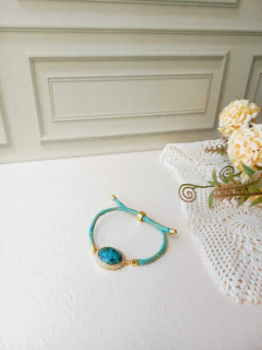 Imagem do PULSEIRA CORDÃO COM PEDRA NATURAL CRAVEJADA ESMERALDA