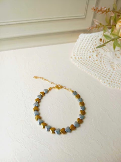 PULSEIRA CORAÇÃO DE HEMATITA METALIZADA - comprar online