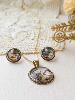 CONJUNTO REDONDO COM APLICAÇÕES DE RÓDIO NEGRO ABALONE FACETADA na internet