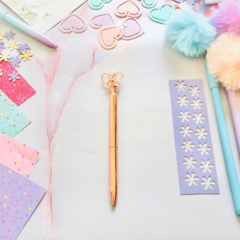 Bolígrafo dorado con Mariposa