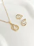 CONJ9497 - CONJUNTO COLAR + BRINCO GOTA DUPLA VAZADA CRAVEJADA - FOLHEADO A OURO - comprar online