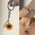 Kit Girassol - Pulseira, chaveiro e colar