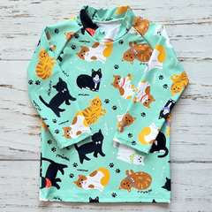 Remera UV Gatos
