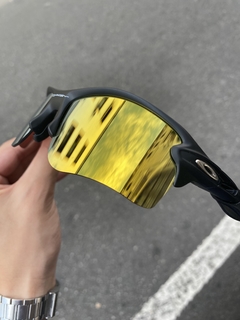 Flak 2.0 preta lente 24k na internet
