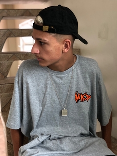 CAMISETA MKS FEAR LARANJA NEON COM CONTORNO PRETO na internet