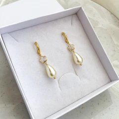 Argola pingente estrela e pérola banhada a ouro - comprar online