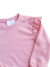 Buzo panal con volados en manga. Rosa - comprar online