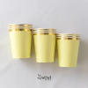 vaso amarillo ondas doradas