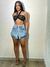 Shorts saia Jeans Feminino Cintura Alta curto Sal e Pimenta - comprar online