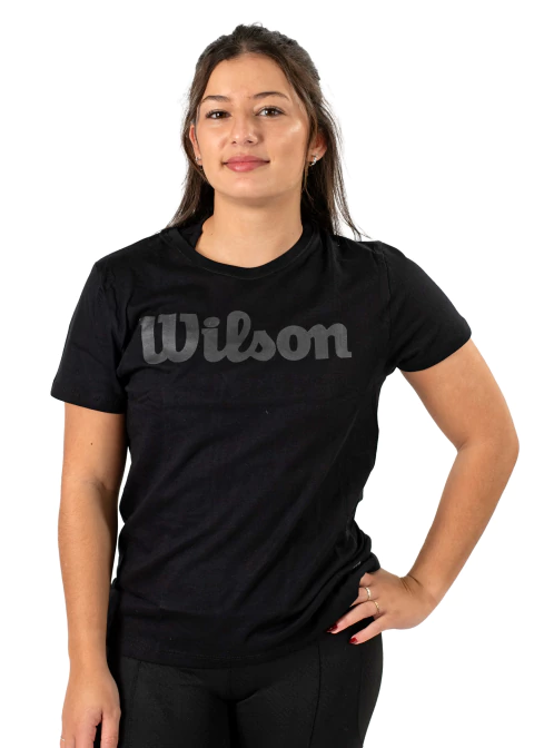 Remera de algodón negra Wilson para mujer modelo XCV, con logo al frente, ideal para uso casual o deportivo.