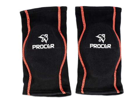 Par de rodilleras elásticas Procer Voley Wave 2 negras con detalles rojos, ideales para protección deportiva en vóley.