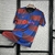 Camisa-Pre-Match-Barcelona-FC-24-25-Nike-Azul-e-Vemelho-Masculino-Torcedor-Authentic-Oficial-Futebol-La-Liga-Espanha-Barça-Camp-Nou-Champions-League-Yamal-Treino-Spotify-