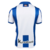 Camisa-Titular-Real-Sociedad-Home-I-24-25-Macron-Branco-e-Azul-Masculino-Torcedor-Futebol-Oficial-Authentic-La-Liga-Espanha-Los-Txuri-urdin-