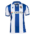 Camisa-Titular-Real-Sociedad-Home-I-24-25-Macron-Branco-e-Azul-Masculino-Torcedor-Futebol-Oficial-Authentic-La-Liga-Espanha-Los-Txuri-urdin-