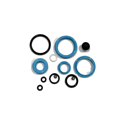 Conjunto de vedação composto por anéis e peças em azul e preto, utilizado em carrinhos hidráulicos.