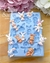 Molde de silicone azul com mini coelhinhos e detalhes em pastel, ideal para confeitaria e artesanato.