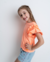 Blusa Olívia Laranja na internet