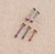 Piercing de tragus CUBITO tornasolado