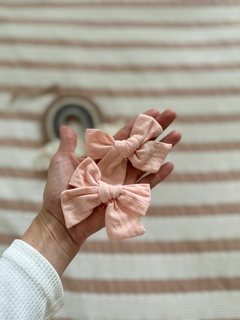Hebilla moño rosa claro