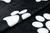 POLAR SOFT ESTAMPADO HUELLAS FONDO NEGRO - comprar online