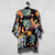 Quimono/Vestido Flora Mística com Barrado e Mangas Longas Preto - comprar online
