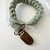 Prendedor de Chupeta Boho | Verde Palha - comprar online