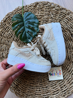 • Tênis Nike infantil