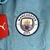 Corta vento Manchester City 23/24 Azul Celeste e Branca - FUTBOYMARCA 