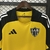 Camisa de treino do Atlético MG nas cores amarela e preta, com detalhes em preto e logo do clube.