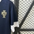 Camisa de treino da Seleção de Portugal 2025/2026 em azul marinho e branca com o escudo da FPF.