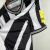 Camisa Newcastle United I 23/24 Preta e Branca - loja online