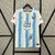 Camisa Málaga CF I 24/25 Azul Celeste e Branca