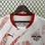 Camiseta do RB Leipzig, branca com detalhes vermelhos e logotipo da Puma