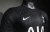 Camisa Tottenham III 25/26 versão jogador nas cores preta e cinza com logo Nike e escudo do time