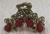 Broche de metal con piedra grande