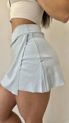 Short pollera celeste con bolsillo en internet