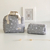 Bolsito + Cambiador Estrellas Gris - comprar online