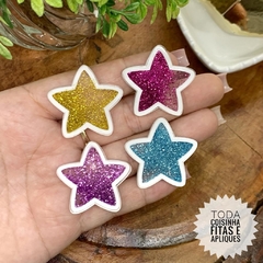 APLIQUE ACRÍLICO ESTRELA VAZADA COM GLITTER - UNIDADE