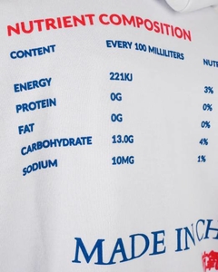 Em suas estampas, esse produto possui uma estampa de uma caixa de chá de limão chinês, contendo informações nutricionais, ingredientes, número de fabricação e etc. As tintas utilizadas nesse processo são importadas e 100% de origem de matérias recicláveis