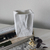 FLORERO CEMENTO PAPER BAG en internet